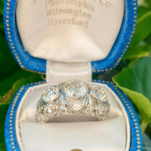 three stone diamond ring in box