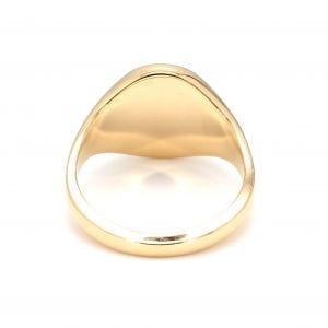Back view of ring. A polished yellow gold shank leads to the back of a polished oval signet face.