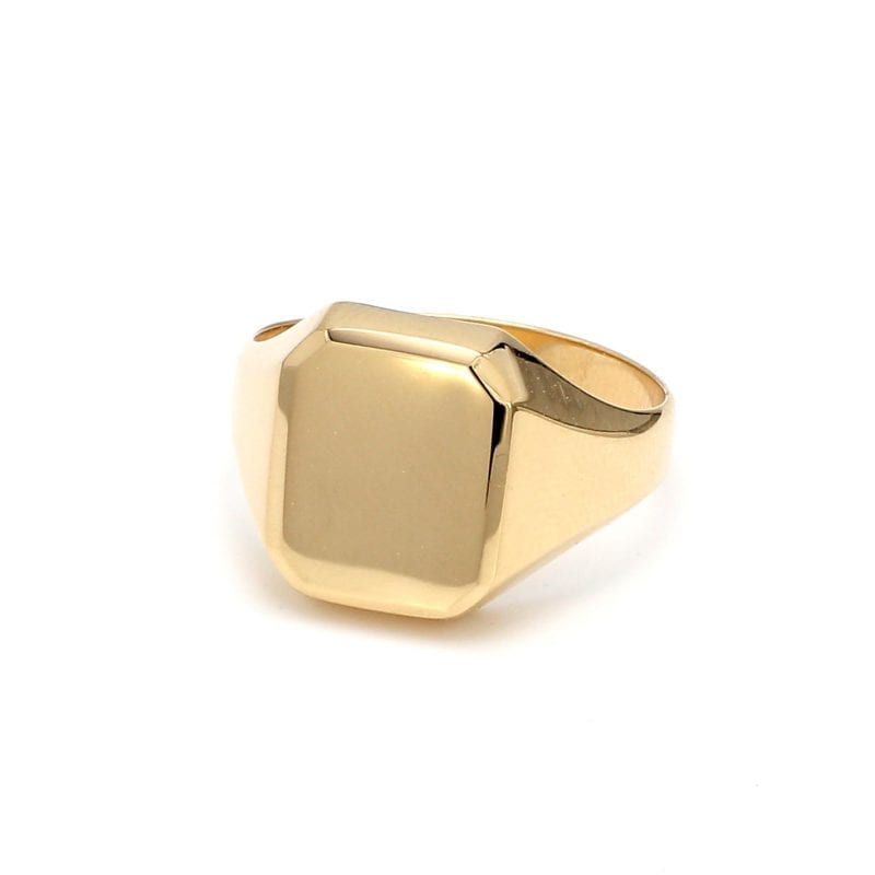 Front side view of ring. This polished signet ring features a rectangular face with a plain gold shank.