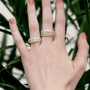 2 yellow and white diamond rings on model