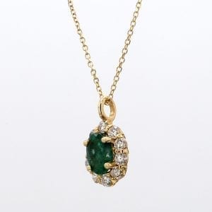 Oval Cut Emerald and Diamond Pendant Necklace in 14k Yellow Gold