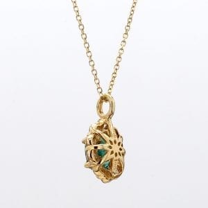 Oval Cut Emerald and Diamond Pendant Necklace in 14k Yellow Gold