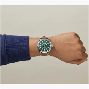 Lifestyle image view of the Shinola Runwell 47mm Green Dial Men's Watch