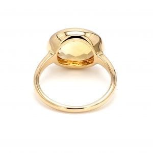 Back view of ring. A polished yellow gold shank is attached to an open setting for a briolette cut oval citrine set east to west.