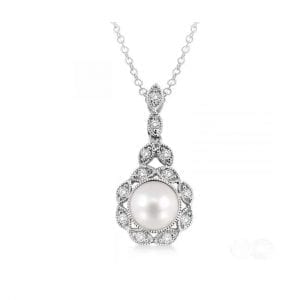 front view of pearl and diamond pendant