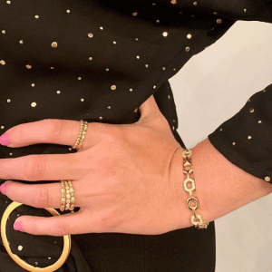 gold rings and bracelet on model
