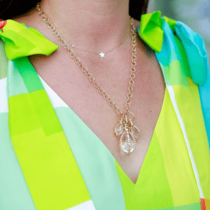 gold necklaces on model