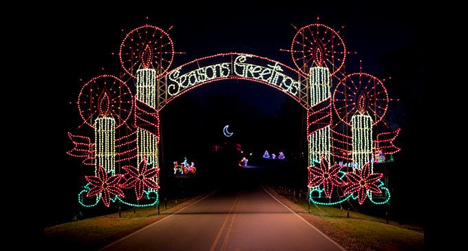 Christmas lights awning that says "Seasons Greetings." 