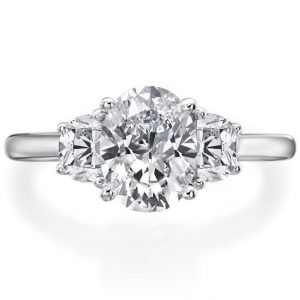 oval with halfmoon three stone engagement ring front view