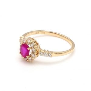 Oval Ruby & Diamond Halo Ring in 14k Yellow Gold