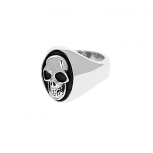 side angle view of silver skull signet ring