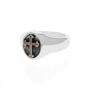 side angle view of silver mens signet ring with black cross in center