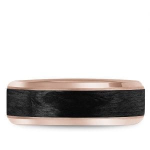 A Bleu Royale rose gold wedding band with a black carbon center and beveled edges.