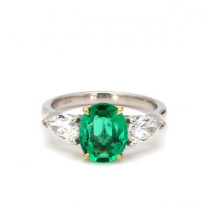 Oval Emerald and Pear Cut Diamond Ring