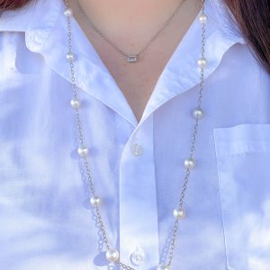 pearl tincup strand necklace with diamond pendant layered