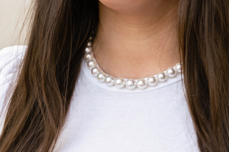pearl strand with white tshirt
