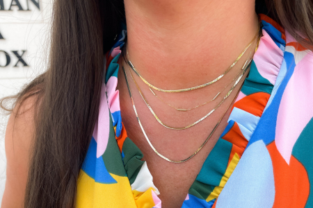 gold chains at multiple lengths