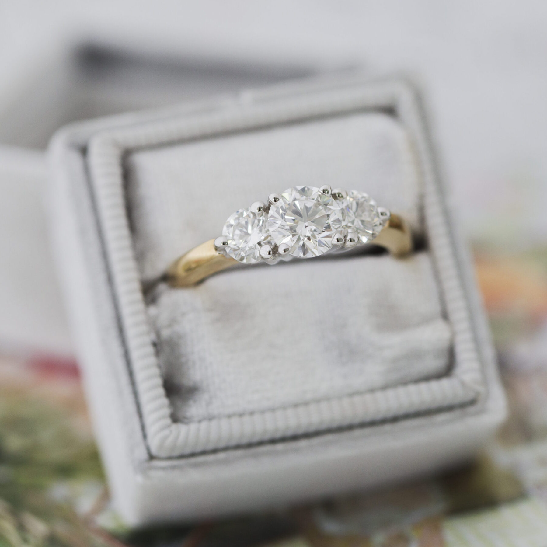 Three stone diamond engagement ring.